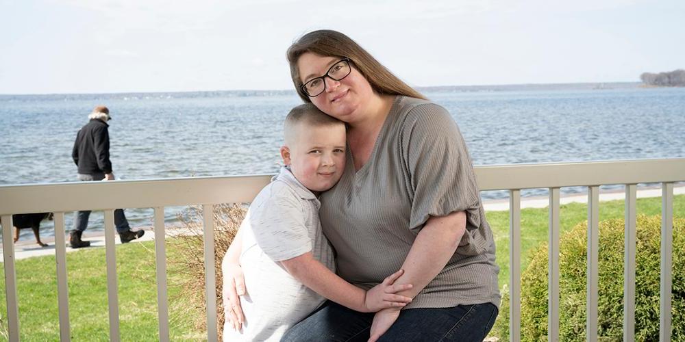 Nina Alfano and her son, Gregory, at William’s Beach in Cicero. She had surgery to treat cervical cancer discovered during the coronavirus pandemic. (photo by Susan Kahn)